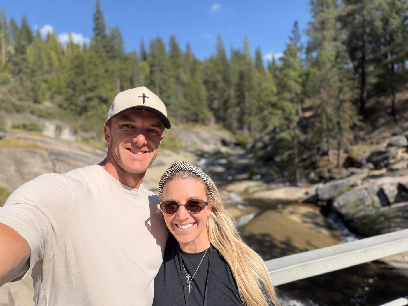 Mitchell outdoors near a mountain stream